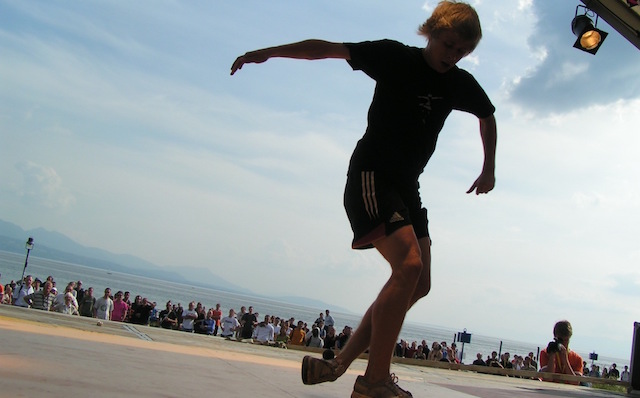 Vasek Klouda on a stage by the ocean 